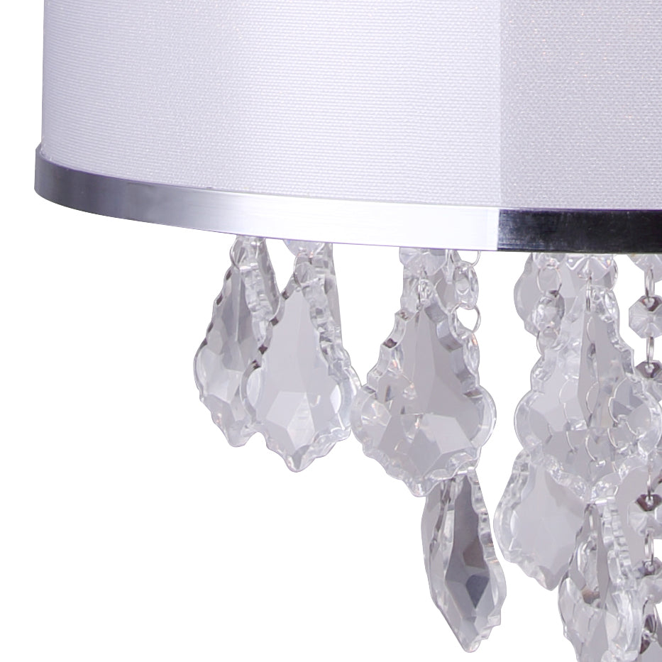 close up photo of the pendant showing white shade, and the clear crystals that hang from the centre of the chandelier