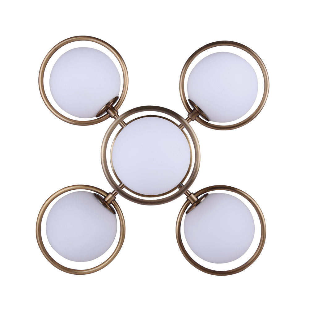 photo angel view looking up at a semi flush, five light, gold finish with five flat opal globes in a mid century style