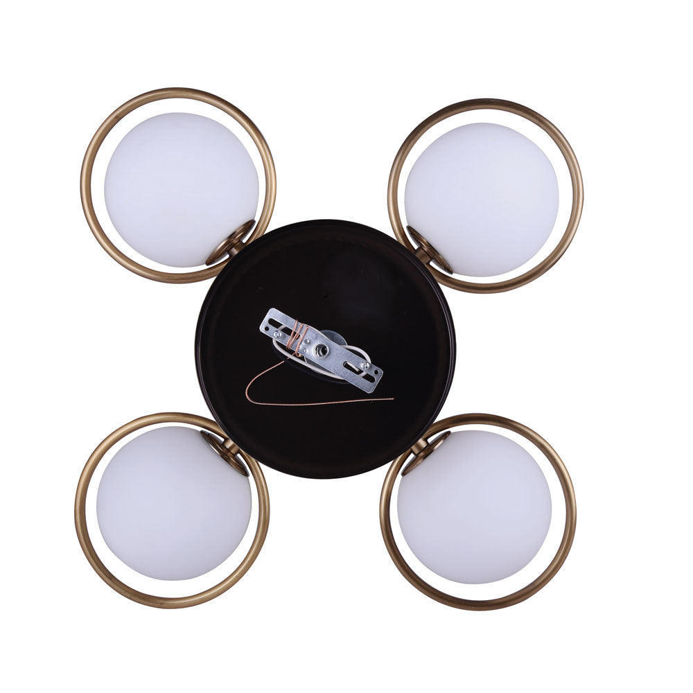 photo angel view looking up at a semi flush, five light, gold finish with five flat opal globes in a mid century style also showing the wiring that is inside the canopy
