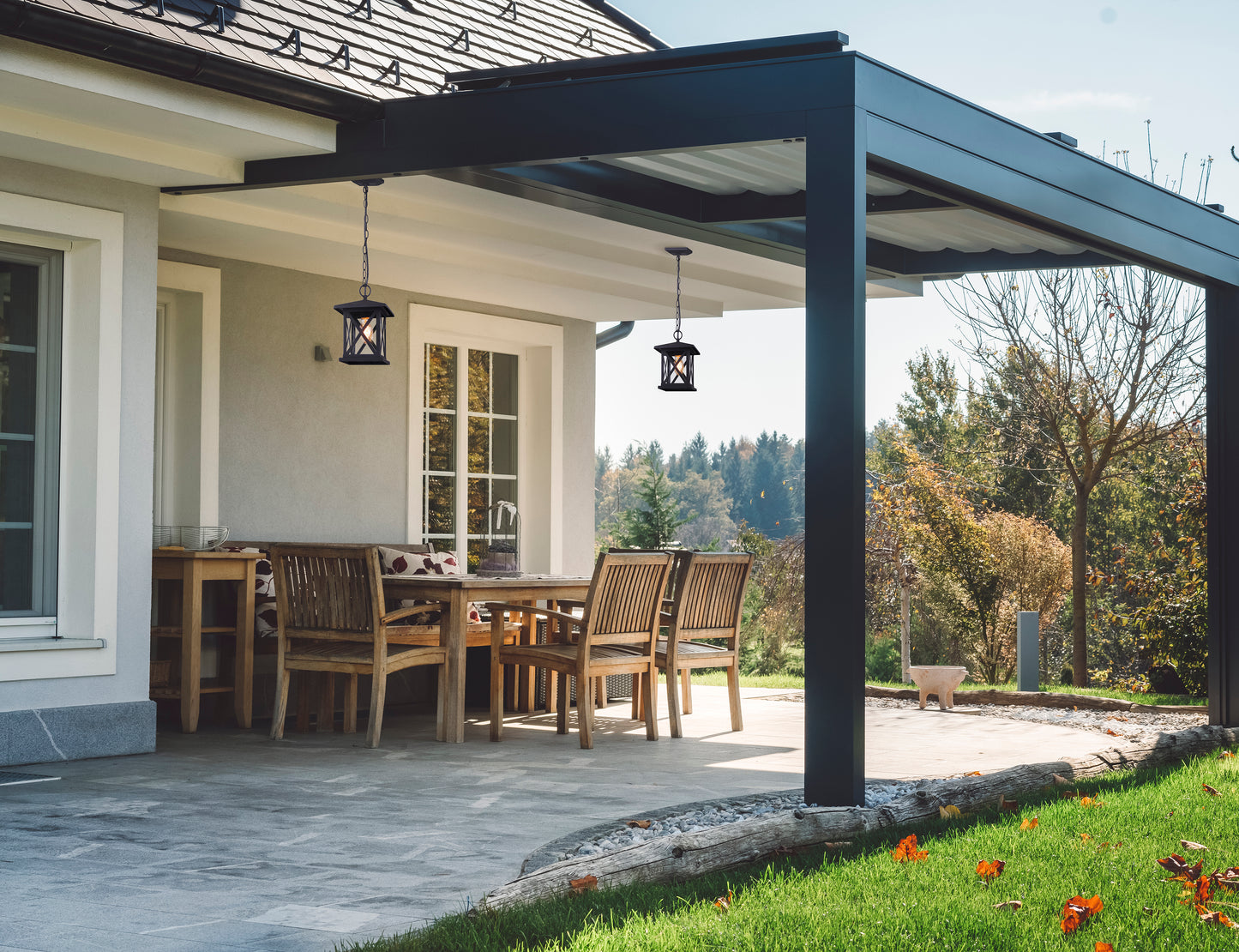 back deck with two hanging 1 light pendant with outdoor seating